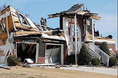 Photo showing a home that was totally destroyed in a fire.